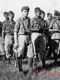 11 1935-36 Banda militare in marcia sul prato